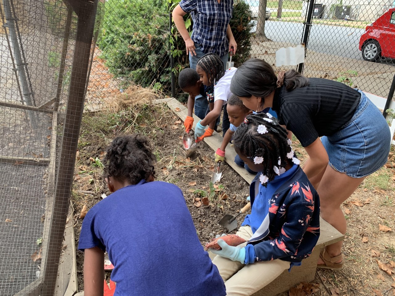 Megan working on a community garden. 