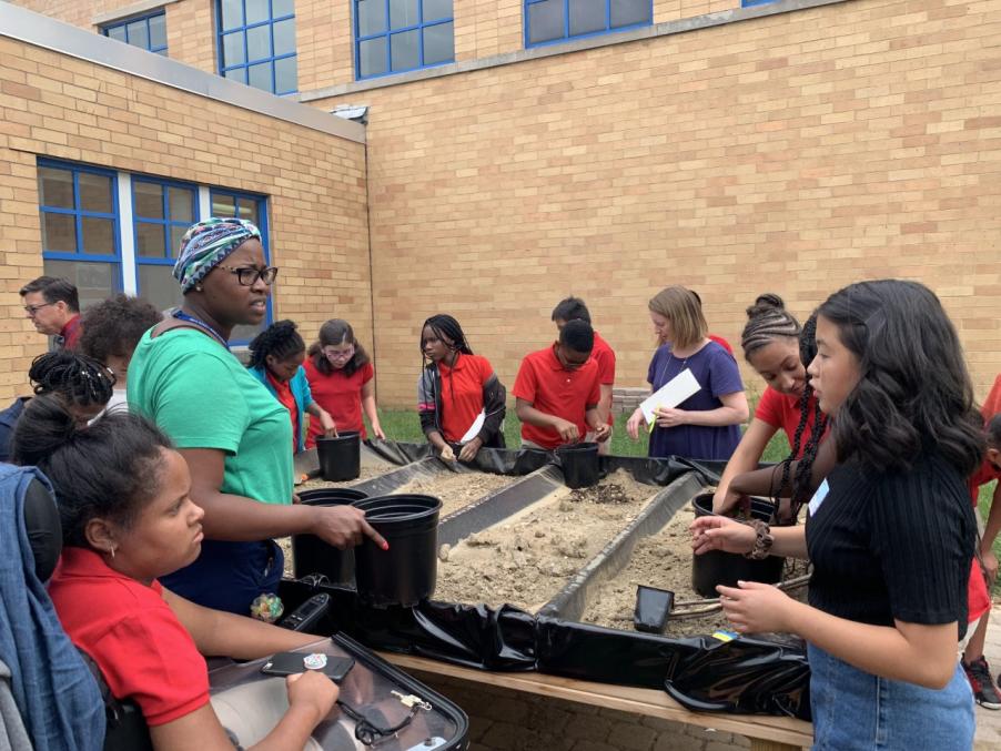Students working on a community harden, part of Megan's initiative. 