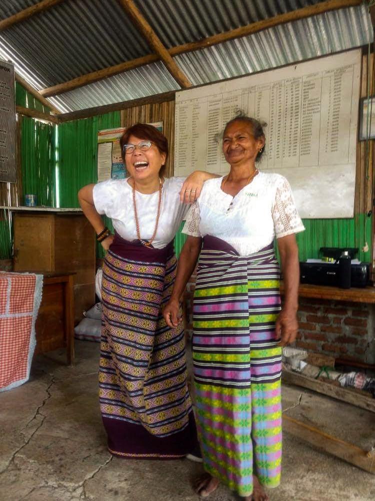 Two women enjoying working together. 