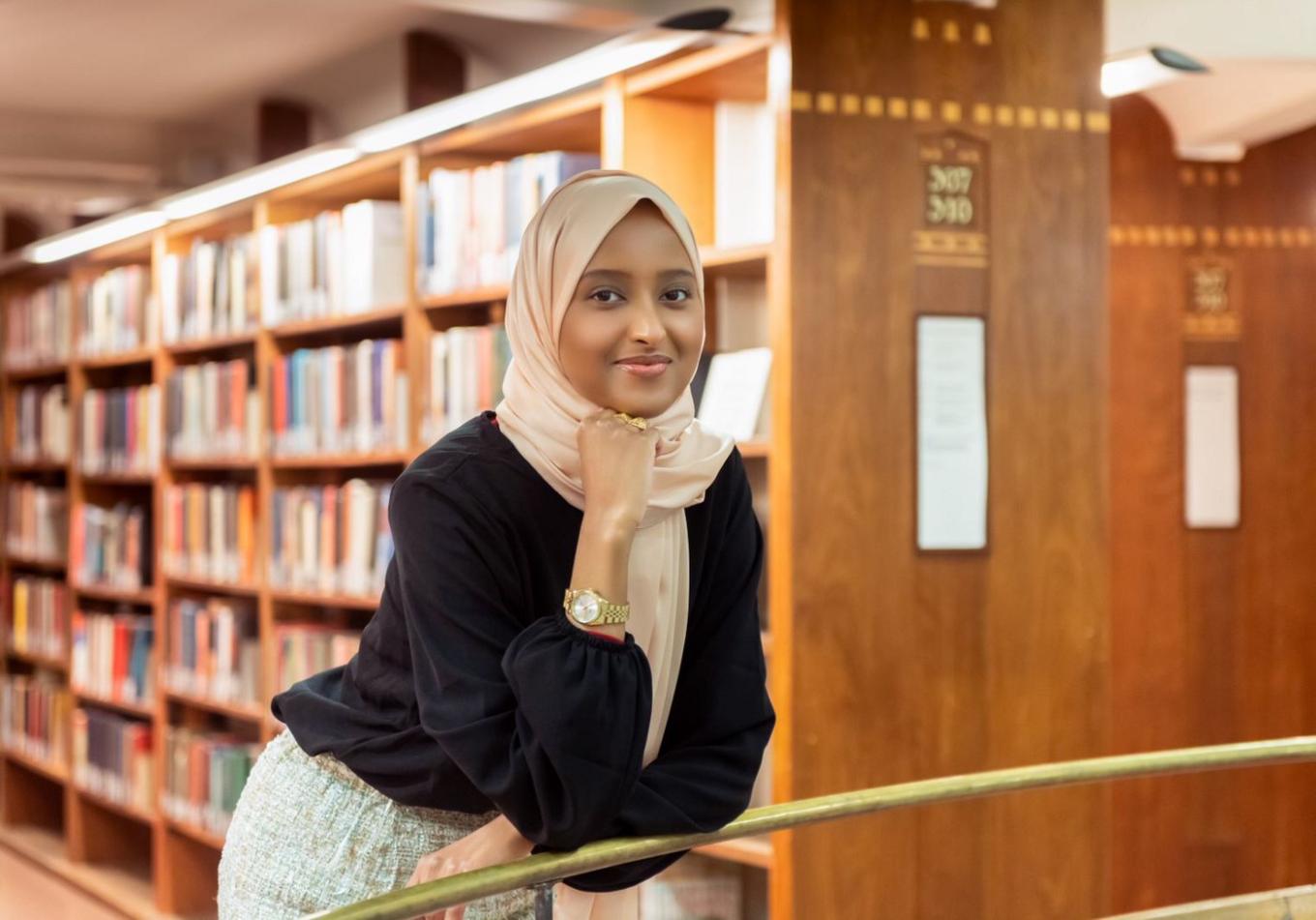 Salaado Qasim, co-founder of RAHY in a school library
